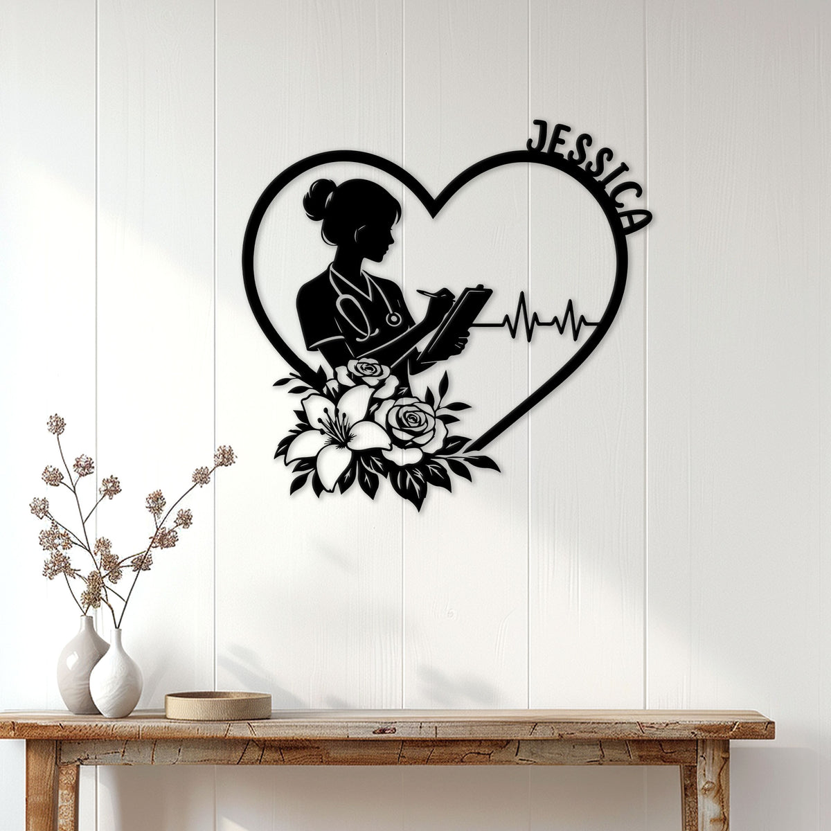 Nurse heart metal wall sign displayed on a white paneled wall above a wood console