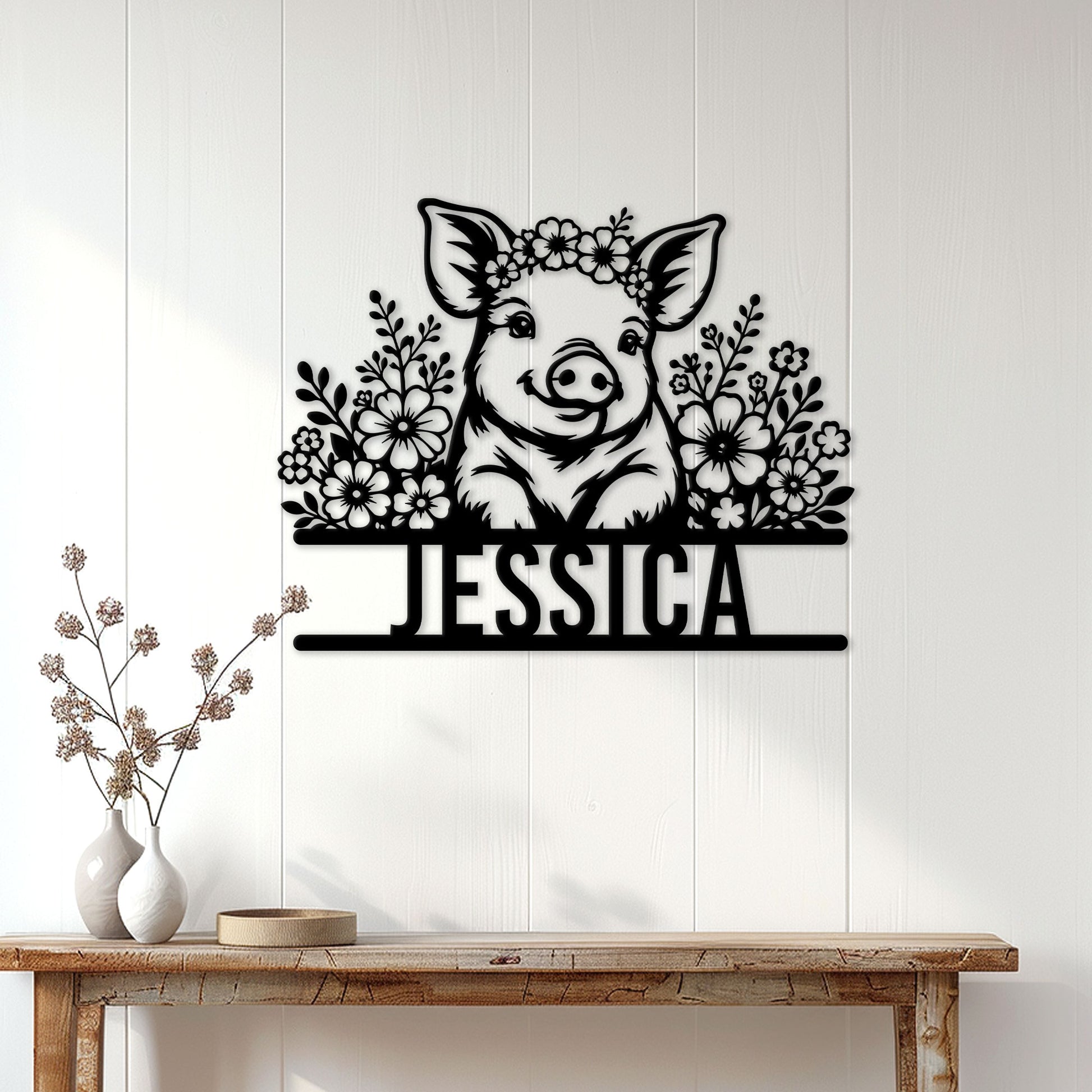 Floral pig metal wall sign displayed above a console table in a bright farmhouse-style entryway