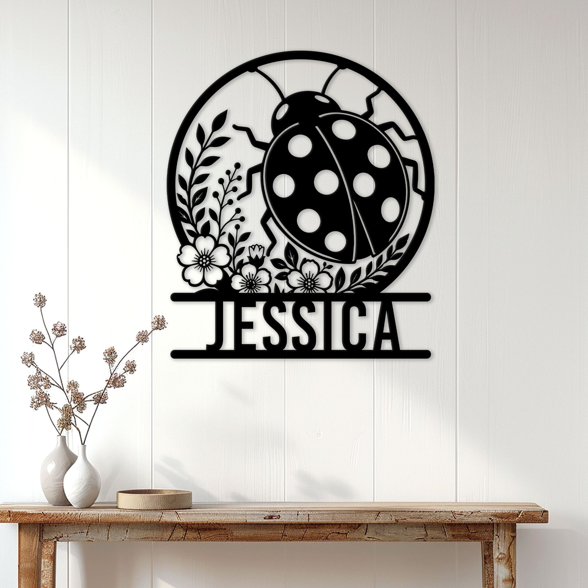 Ladybug wall sign displayed on a light wood-paneled wall above a console table