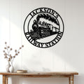 Railroad wall decor displayed above a console table in a bright home entryway