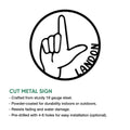 Cut metal ASL sign displaying a bold American Sign Language hand gesture in a circular design