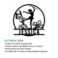 Baton twirling metal sign featuring an elegant performer silhouette framed by decorative swirls