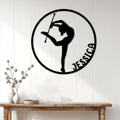 Baton twirling wall sign displayed on white paneling above a wooden console table
