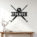 Billiards wall sign displayed above a console table with an 8 ball and crossed pool cues