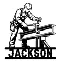 Ironworker metal sign featuring a hard-hat worker fastening a steel beam with hand tools