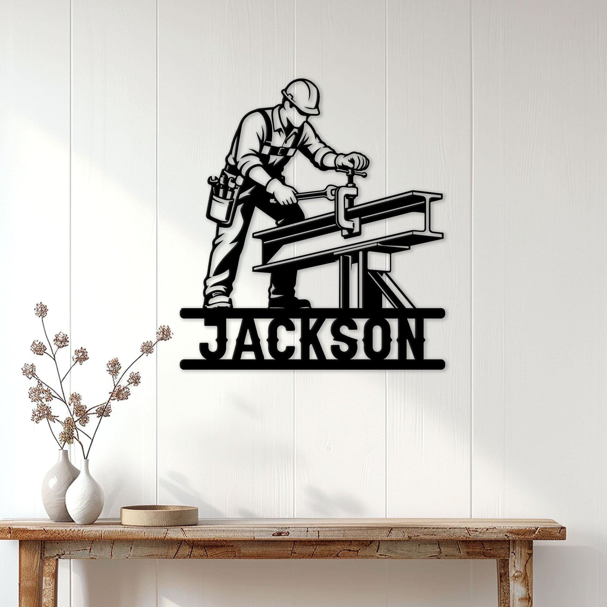 Ironworker wall sign displayed on white paneling above a rustic console table