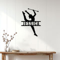 Baton twirling metal wall sign displayed above a console table in a bright home interior