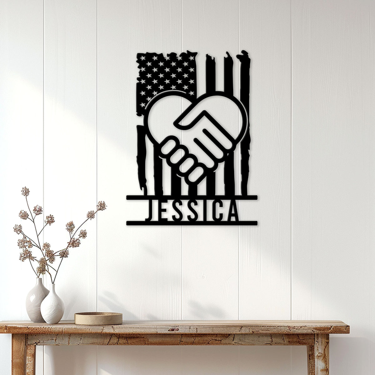 Patriotic caregiver wall sign displayed on a white paneled wall above a console table