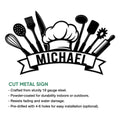 Black chef-themed cut metal sign featuring a chef hat and an arrangement of kitchen utensils