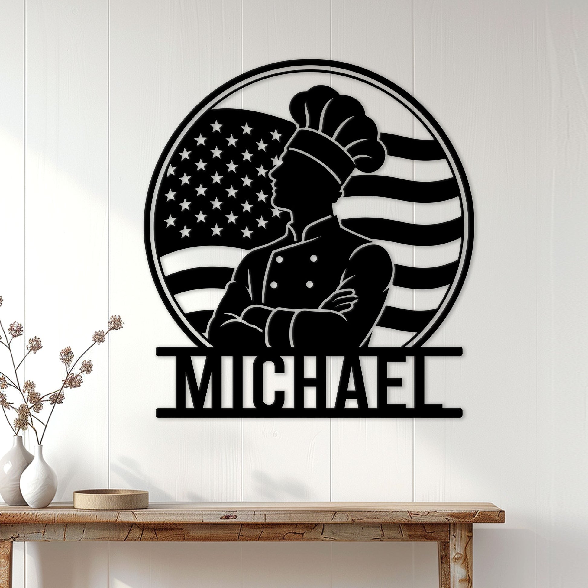 American chef metal wall sign displayed on a white paneled wall in a home interior