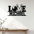 Bowling metal wall decor displayed on a white paneled wall above a console table