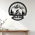 Mountain biking wall sign displayed on white paneled decor above a wood console table