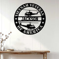 Vietnam Veteran wall sign displayed on a light wood-paneled wall above a console table