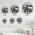 Garbage truck metal sign size guide showing six square size options arranged on a home interior wall