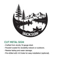 Lake house metal sign feature graphic showing a mountain lake design with pine trees, canoes, and fishing silhouettes