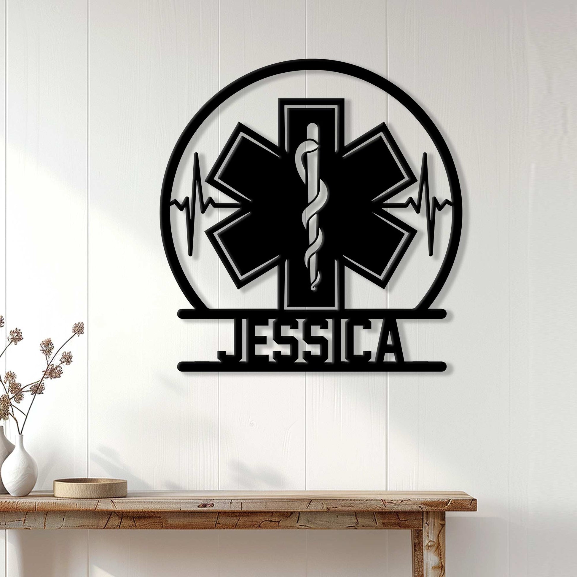Paramedic wall decor displayed above a console table, featuring bold Star of Life and heartbeat artwork