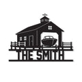 Custom boat house metal sign featuring a waterfront boathouse, dock, and motorboat silhouette