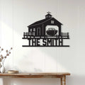 Boat house metal wall decor displayed on a light wood wall above a rustic console table