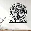Norse Tree of Life metal wall sign displayed on a light wood-paneled wall in a home decor setting