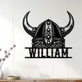 Custom Norse helmet metal wall sign displayed on a light paneled wall as Viking-inspired home decor