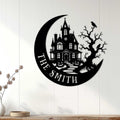 Black Halloween haunted house metal sign displayed as spooky wall decor on white wood paneling
