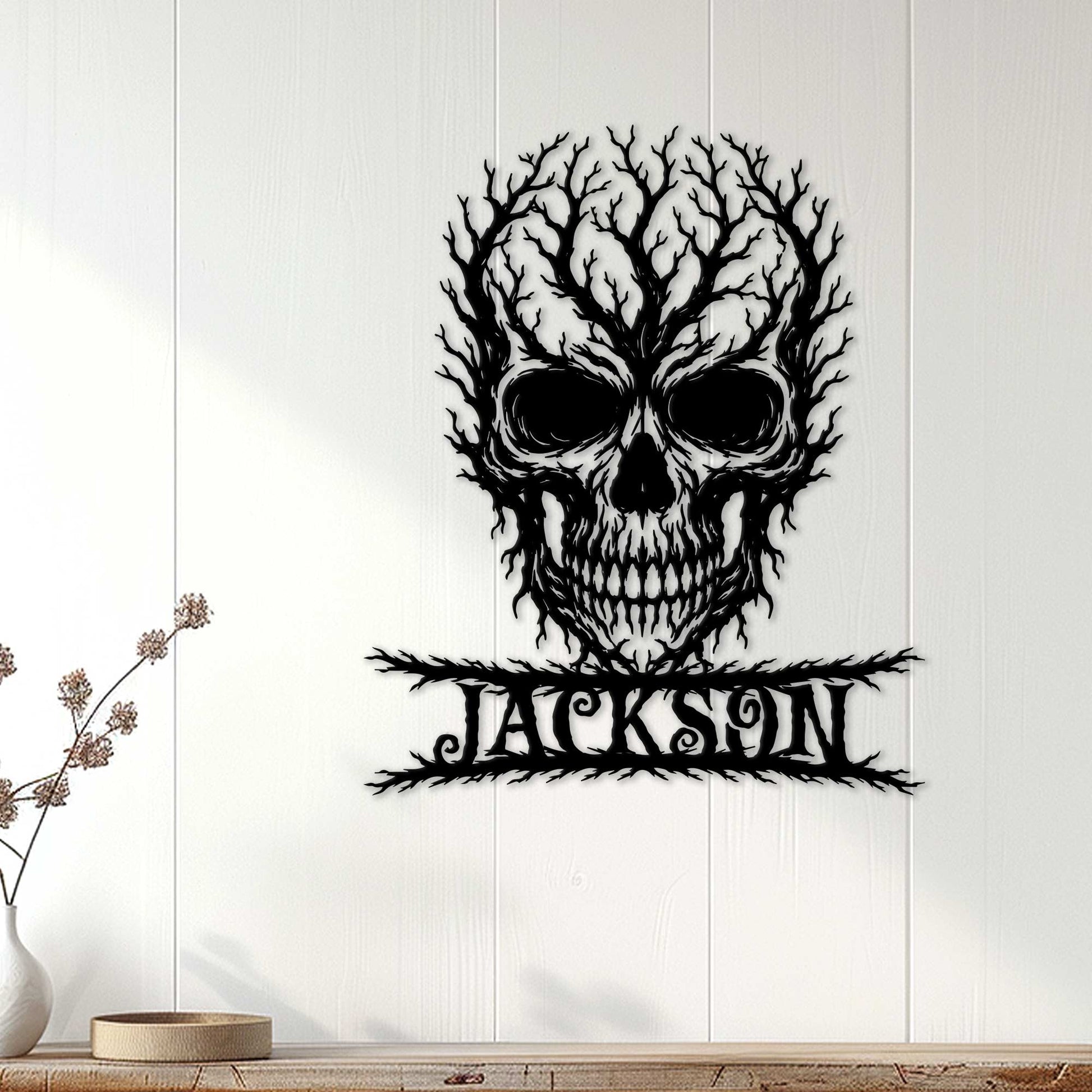 Gothic skull metal sign displayed as dark wall decor on a light paneled interior wall