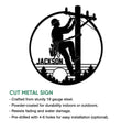 Lineman wall sign feature graphic showing a silhouetted utility worker repairing power lines