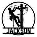 Custom lineman metal sign featuring a utility worker climbing a power pole in bold black silhouette