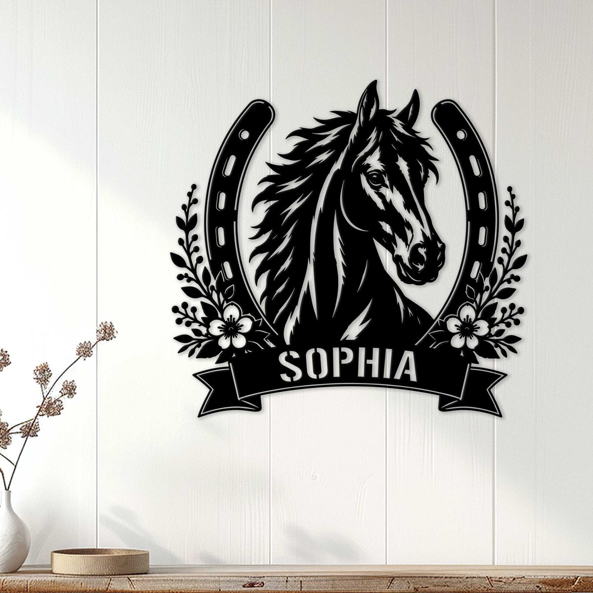 Black horse wall decor displayed on a white paneled wall above a wood console
