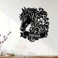 Black horse metal wall art displayed on a light paneled wall in a home decor setting