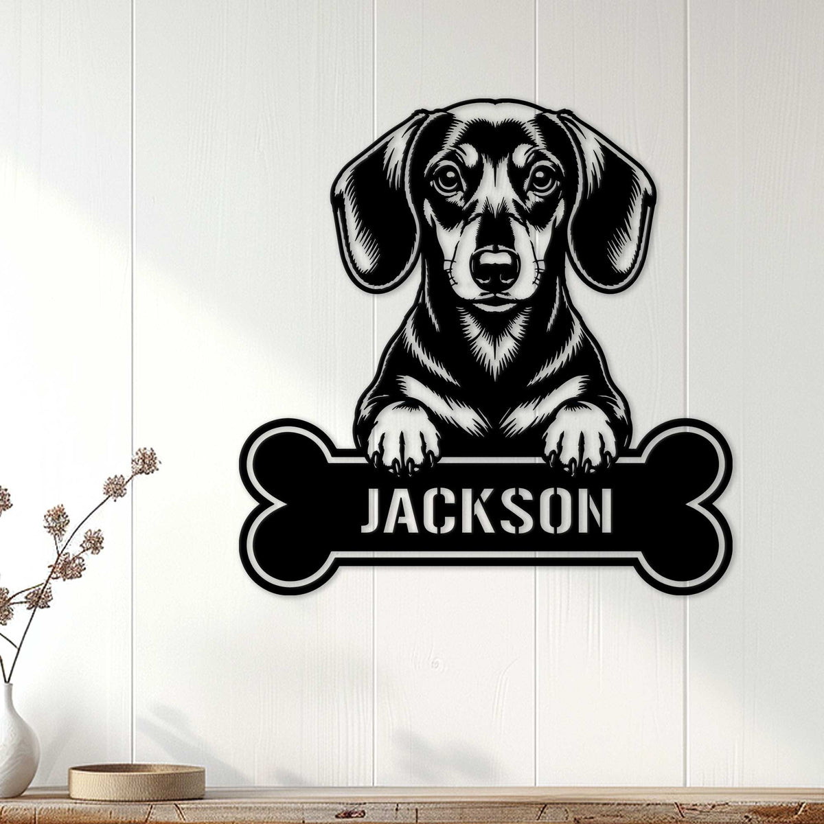 Dachshund metal wall sign displayed on white paneled walls in a cozy home setting