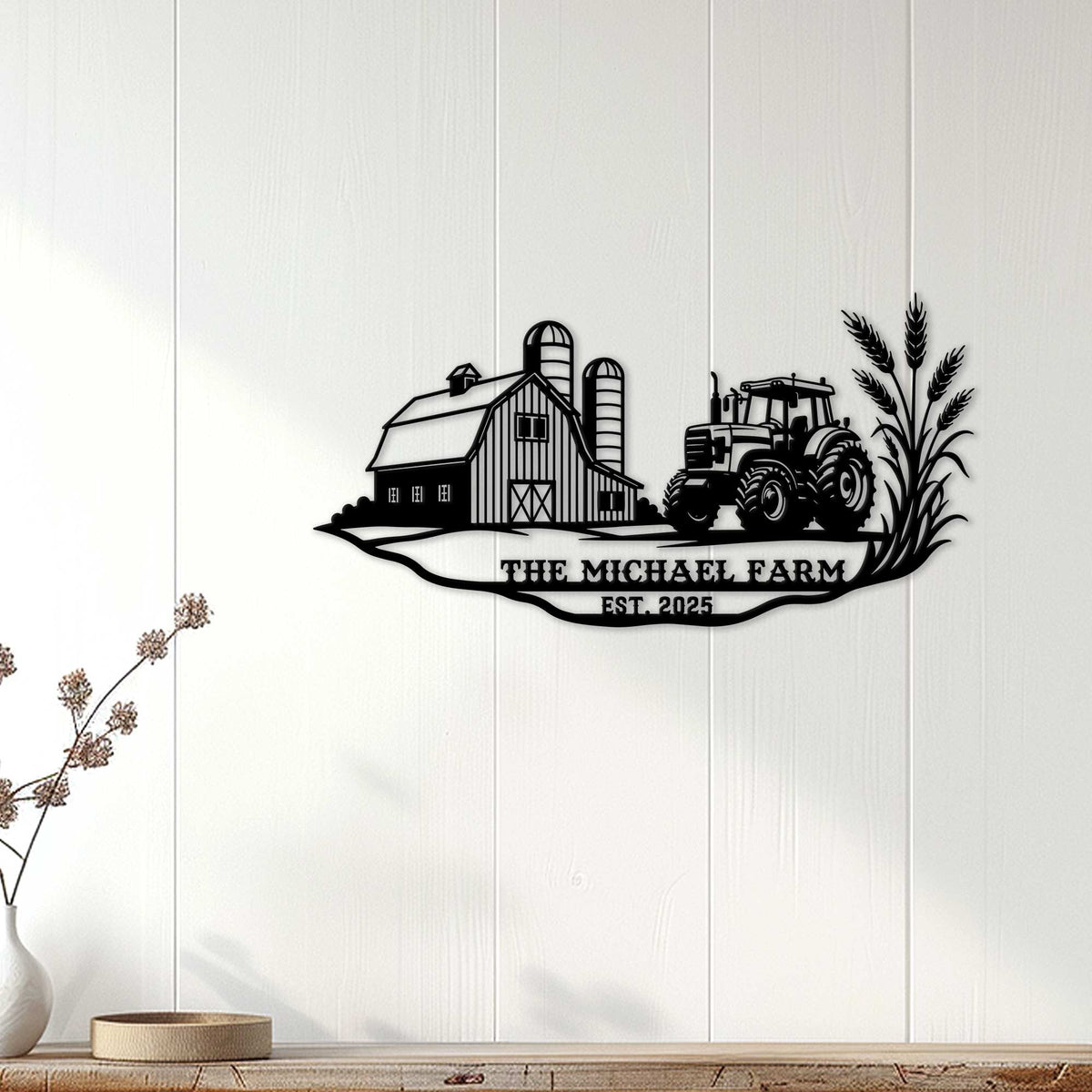 Farmhouse wall decor displayed on a white paneled wall with a barn, tractor, and wheat silhouette