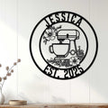 Floral stand mixer metal sign displayed as kitchen wall decor on a white paneled wall