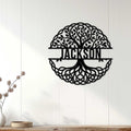 Tree of Life wall decor displayed on a light wood-paneled wall in a bright home setting