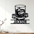 Bourbon whiskey glass metal sign displayed as home bar wall decor in a bright room