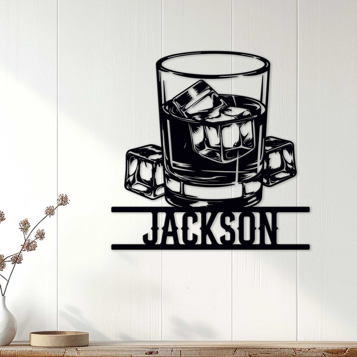 Bourbon whiskey glass metal sign displayed as home bar wall decor in a bright room