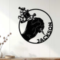 Tattoo artist metal wall sign displayed on a white paneled wall in a modern interior