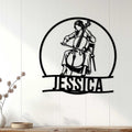 Cellist metal wall sign displayed on white paneling above a console table