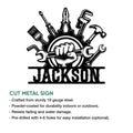 Mechanic metal sign artwork with hand tools arranged around a gear and strong garage decor styling