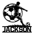 Soccer player silhouette kicking a ball in front of a soccer ball on a metal wall sign