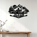 Kayaking metal wall decor displayed on a light wood wall above a console table