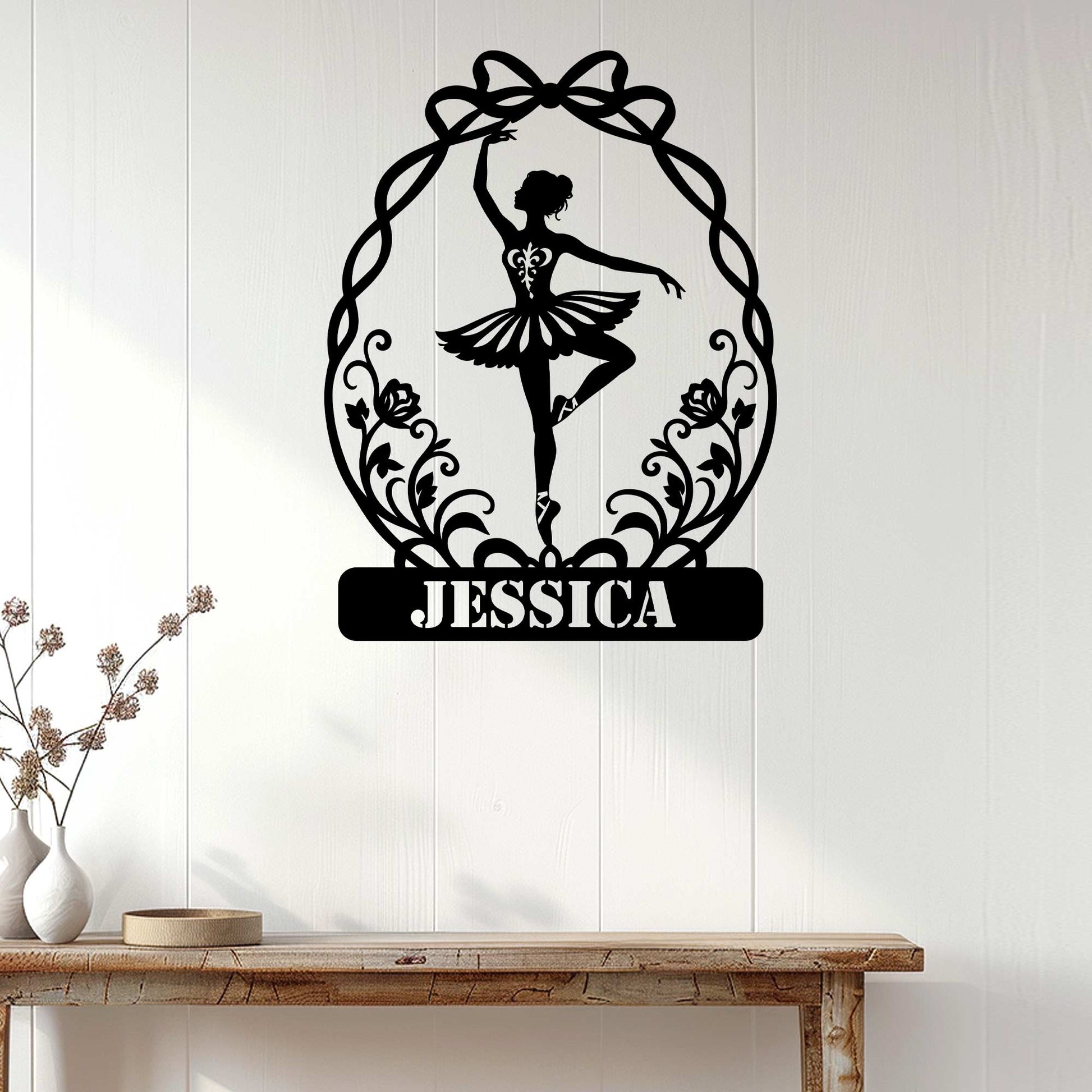 Ballerina silhouette metal wall decor displayed on a light wood-paneled interior wall