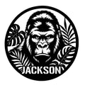 Bold gorilla portrait metal sign framed by tropical leaves in a striking black-and-white design