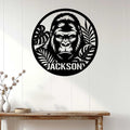Gorilla wall sign displayed on white paneling above a console table in a modern home
