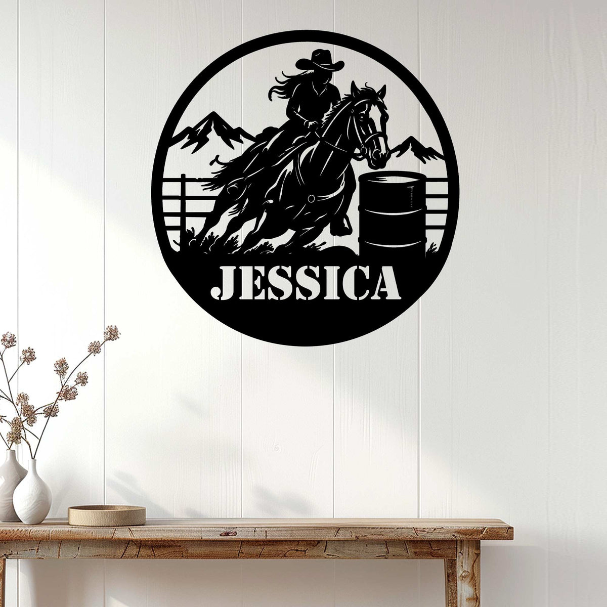 Barrel racing wall sign displayed on white wood paneling above a rustic console table in a home decor setting