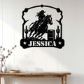 Barrel racing metal wall sign displayed on white wood paneling above a rustic console table
