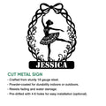 Ballerina metal sign with an elegant floral wreath design for ballet decor