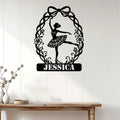 Ballet dancer metal wall sign displayed on a bright white paneled wall