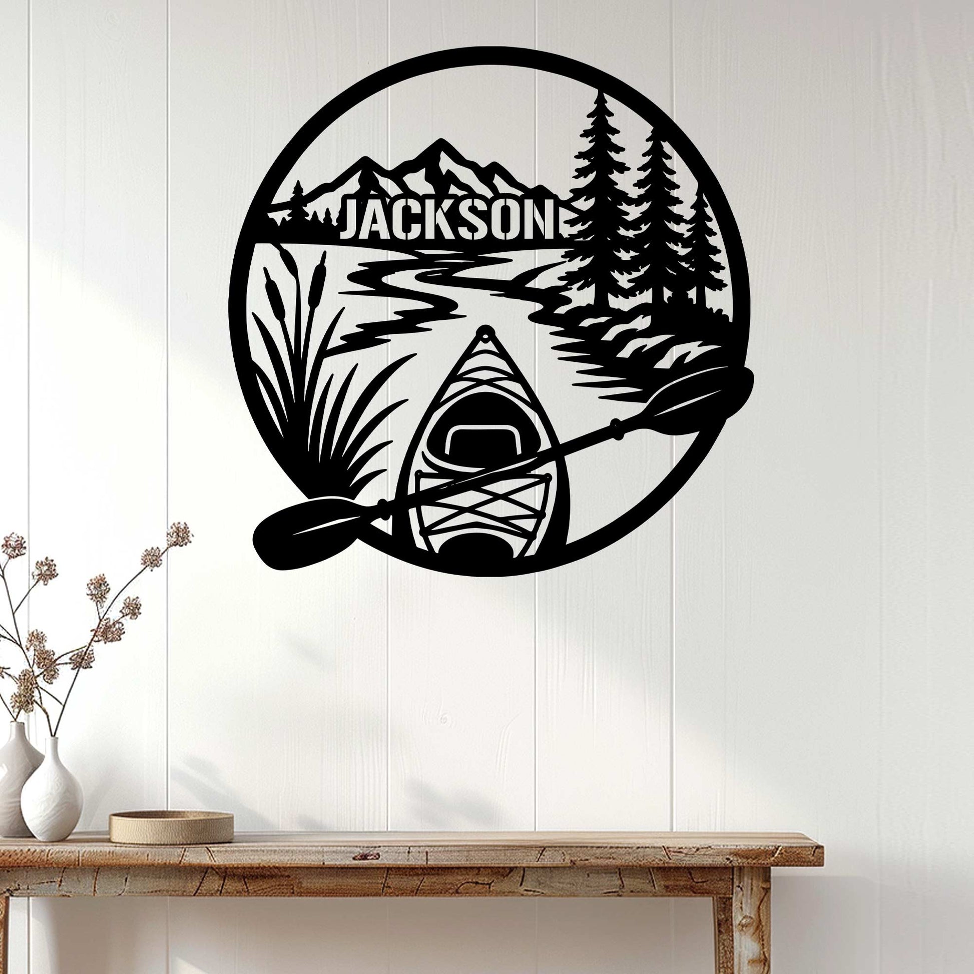 Kayak wall sign displayed on a light wood-paneled wall in a nature-inspired interior
