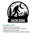 Bigfoot cut metal sign shown with a bold forest silhouette design and round outdoor wall decor shape